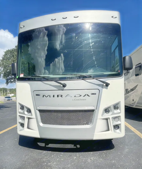 Front view of a Coachmen Mirada motorhome, a great rv rental option for your next trip under a sunny sky.. Coachmen MIRADA 35ESF 2026