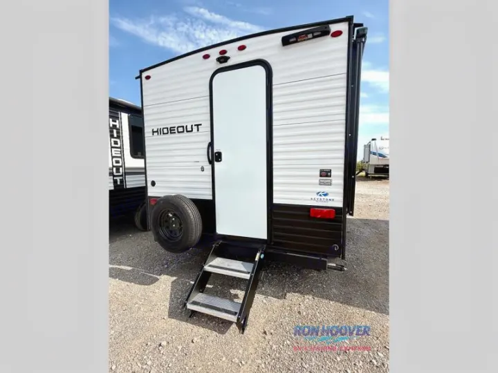 Ready for adventure? This compact HIDEOUT travel trailer rv rental features steps and a spare tire for your next outdoor escape.. Hideout Sport 140RE 2025