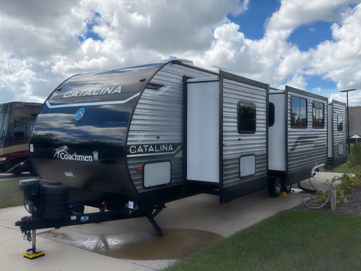 This Coachmen Catalina Legacy Edition travel trailer with slide-outs extended is a perfect rv rental for your next adventure.. Coachmen Catalina Legacy 2024