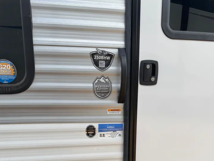 Details of an RV rental: Jayco 250BHW Western Edition travel trailer with G20 tinted windows and Wingmate app info.. Jayco Jay Flight SLX Sport Edition 2026