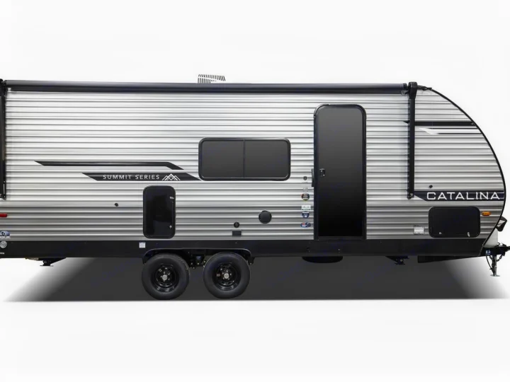 A modern silver Catalina Summit Series travel trailer, with black accents, ready for your next RV rental trip.. Coachmen Catalina Summit 2024