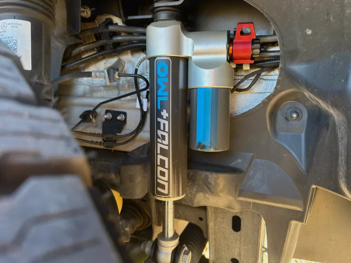 Upgraded OWL+FALCON off-road suspension on a Mercedes Benz Sprinter van, ideal for a rugged RV rental.. Mercedes-Benz Sprinter 2023