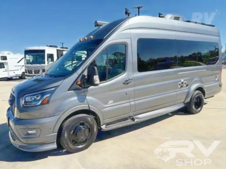 Explore in style with this gray camper van rv rental, a Class B RV perfect for adventure and travel.. Midwest Automotive Designs Passage 2024