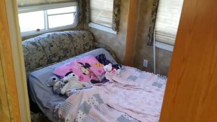 Rear theatre room with bed out . Keystone Challenger 2005