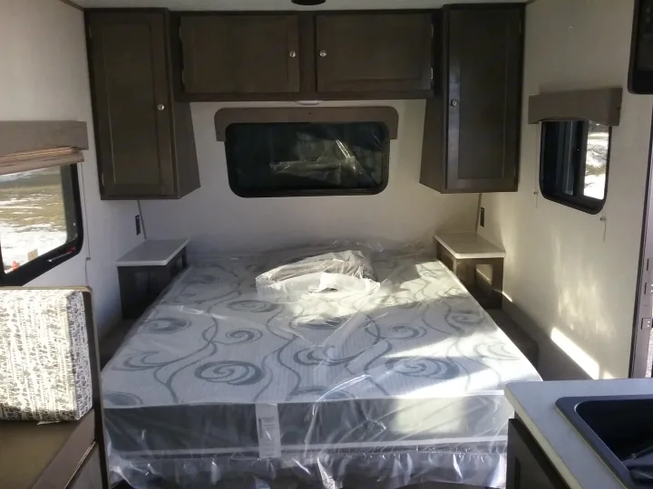 Queen bed in the front with windows all around!. Coachmen Viking 2019