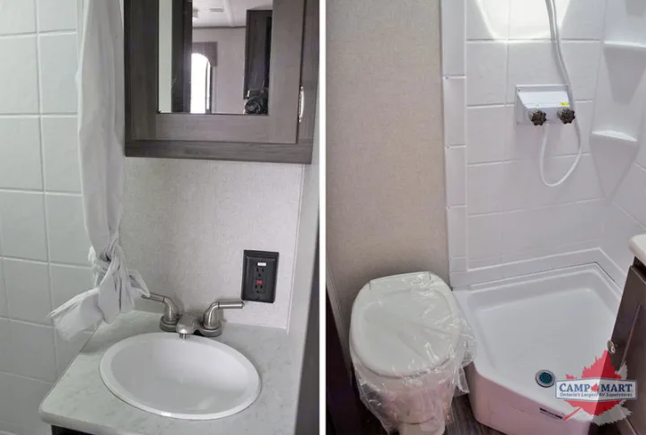 Inside a clean RV rental bathroom, find a compact sink, faucet, mirror, toilet, and stand-up shower for your travels.. Grand River 16RB 2019