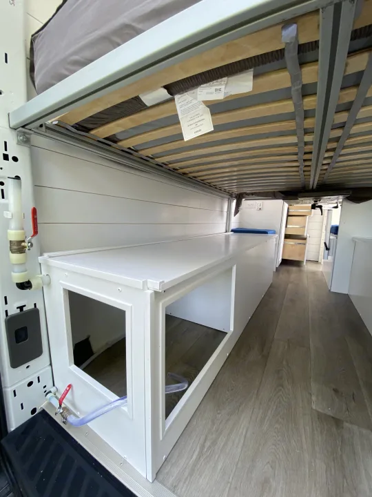 Our storage garage can fit bicycles, paddleboards, and anything else you can think of.  All at once!  We have 2x the space of a truck bed. . Ford Transit 2020