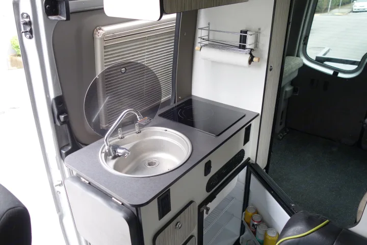 Fridge and freezer ready for your tasty treats and beverages.  21 Gallons water onboard.  Hot water in the sink and shower.. Winnebago Revel 2019