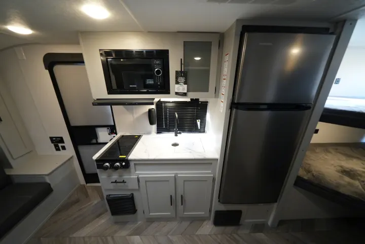 Kitchen : fridge, microwave, stove, sink. Wildwood FSX 178BHsk 2022
