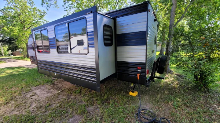 Slide is wider than normal. Electrical connection is 50 amp, but I include all the electrical adapters  you'll need for 30, 20 or even 15 amp service.. Forest River Cherokee 2021