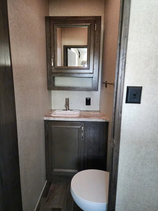 Half bath in the bunkhouse. Keystone RV Montana High Country 2019