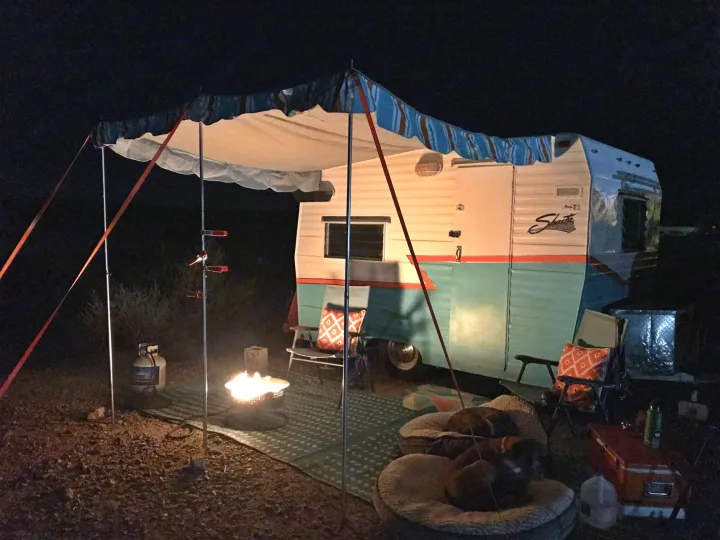 Night time fun with propane fire pit. . Shasta Compact 1969