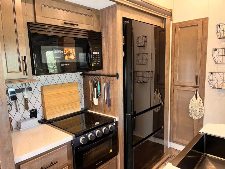 Fully stocked kitchen with everything you need to prepare a meal. . Forest River Sabre 2022