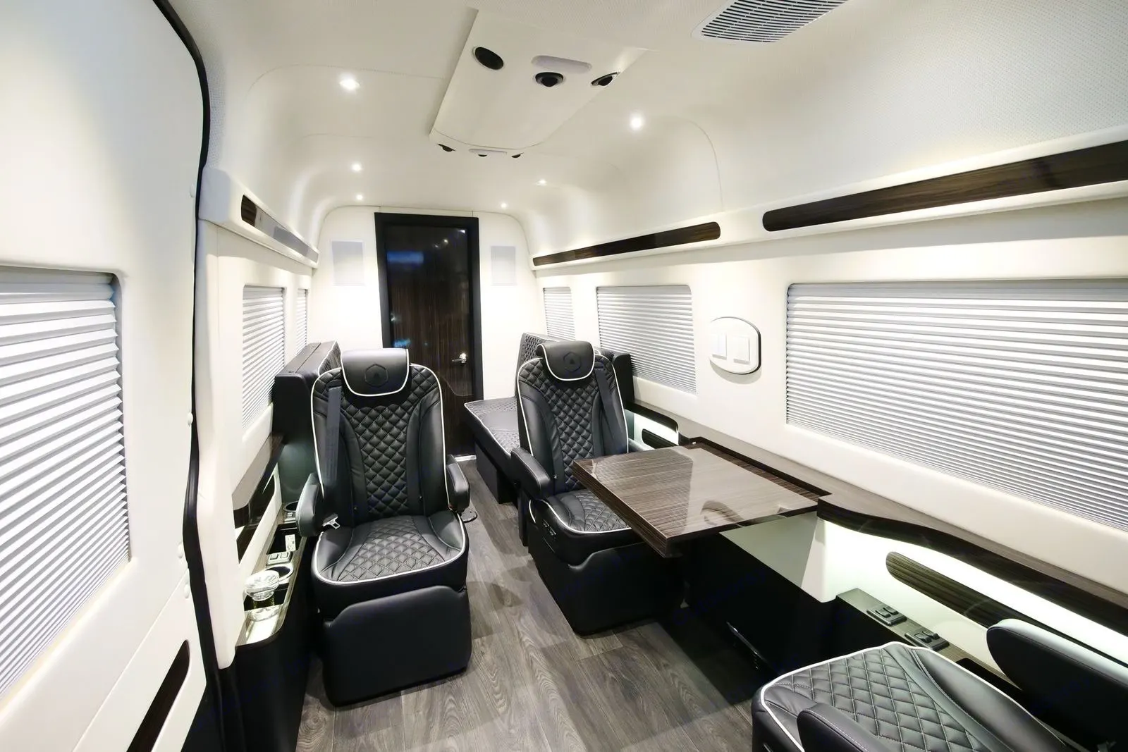 The executive suite gives you focus time.. Mercedes-Benz Custom Coach 2018