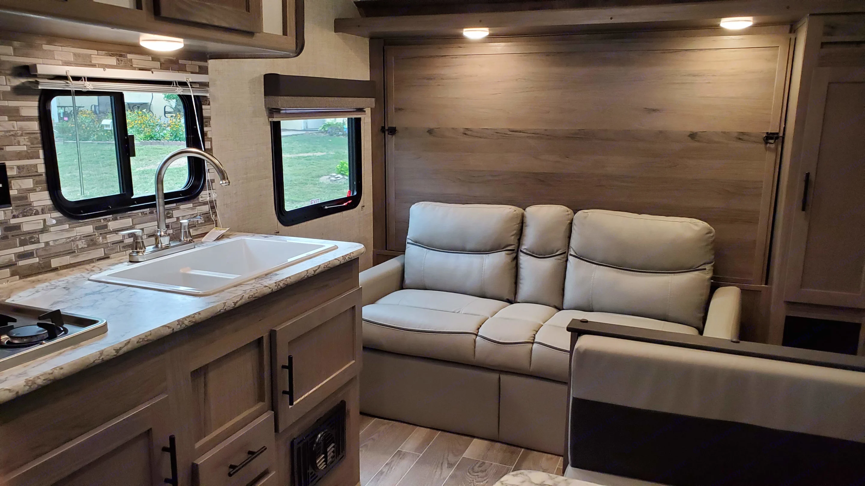Don't just sit on the bed, convert it to a nice comfortable sofa!. Gulf Stream Ameri-Lite 2021
