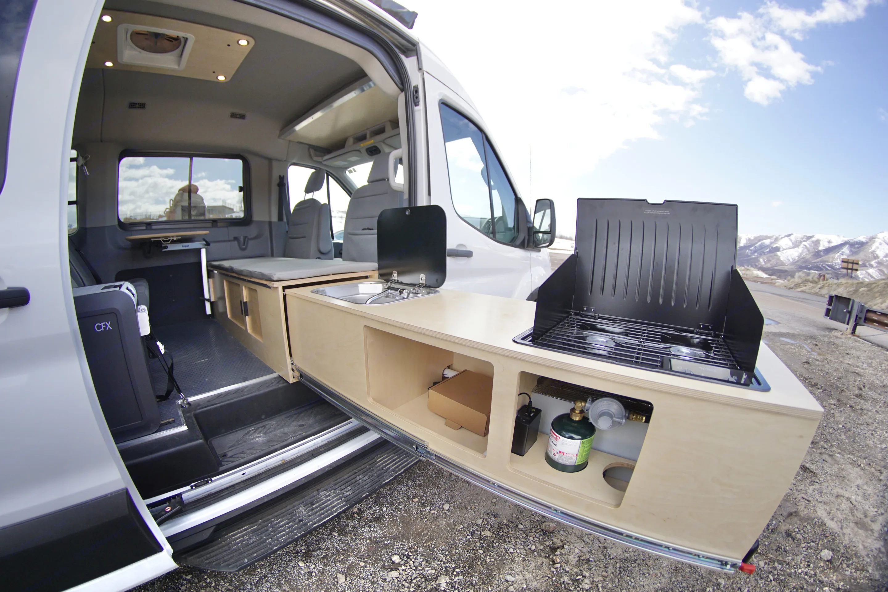 Kitchen can be used outdoors under the awning or inside.. Ford Transit Custom 2019