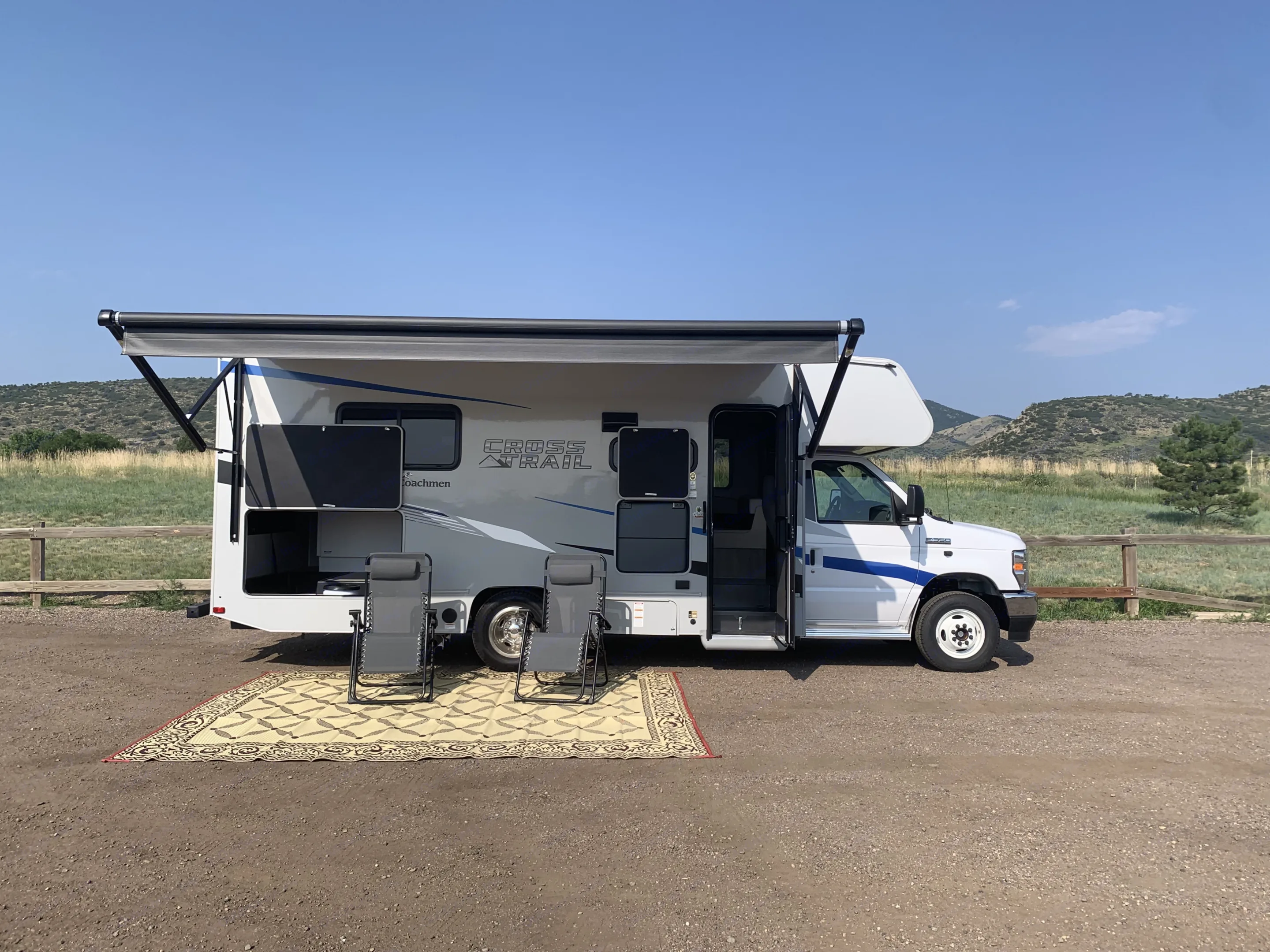 Powered awning allows you to take a break from the sun. Outdoor rug is included with rental. . Other Other 2021