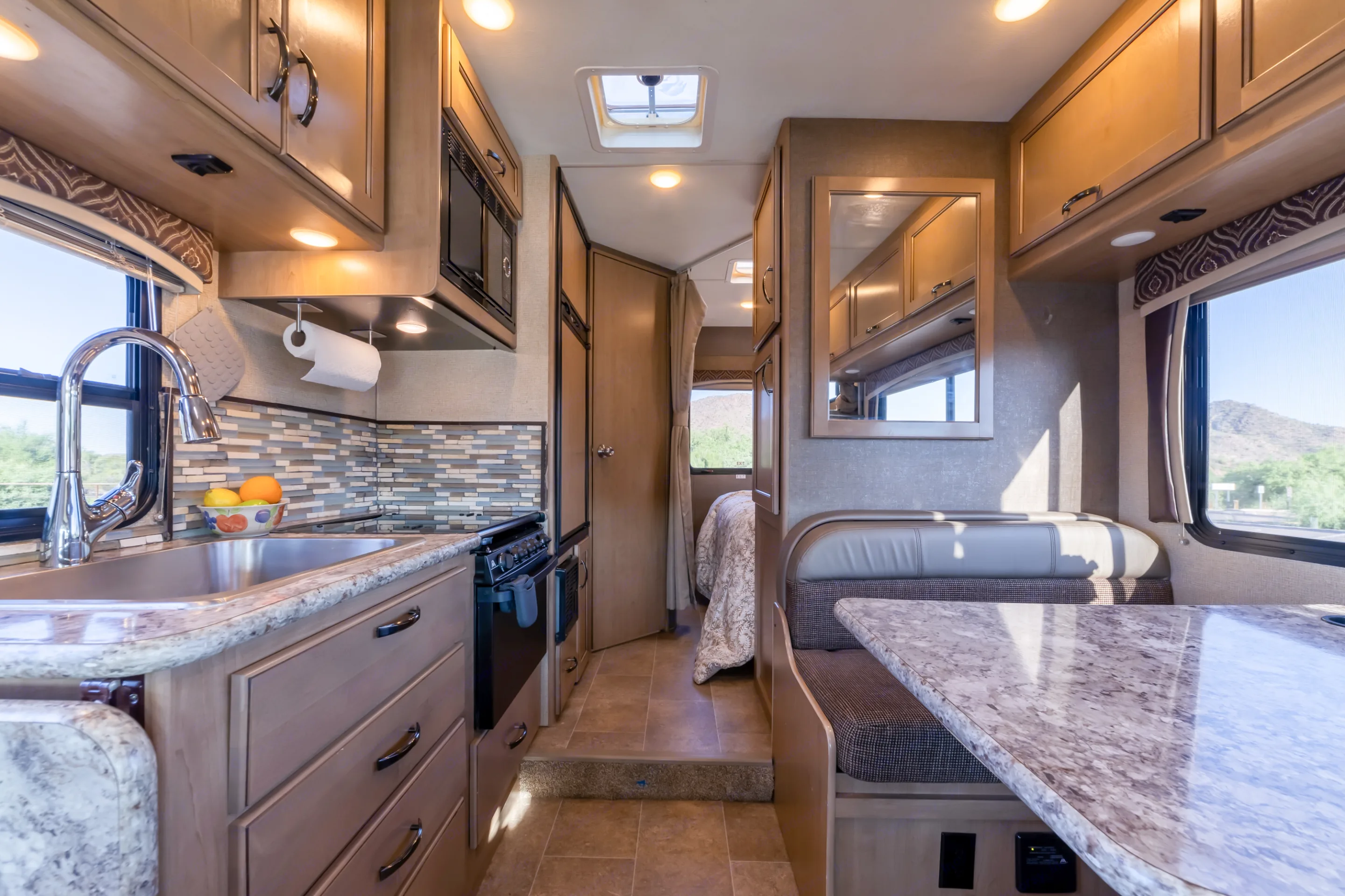 Layout makes sense for entertaining with separate sleeping/bathroom areas.. Thor Motor Coach Chateau 2018
