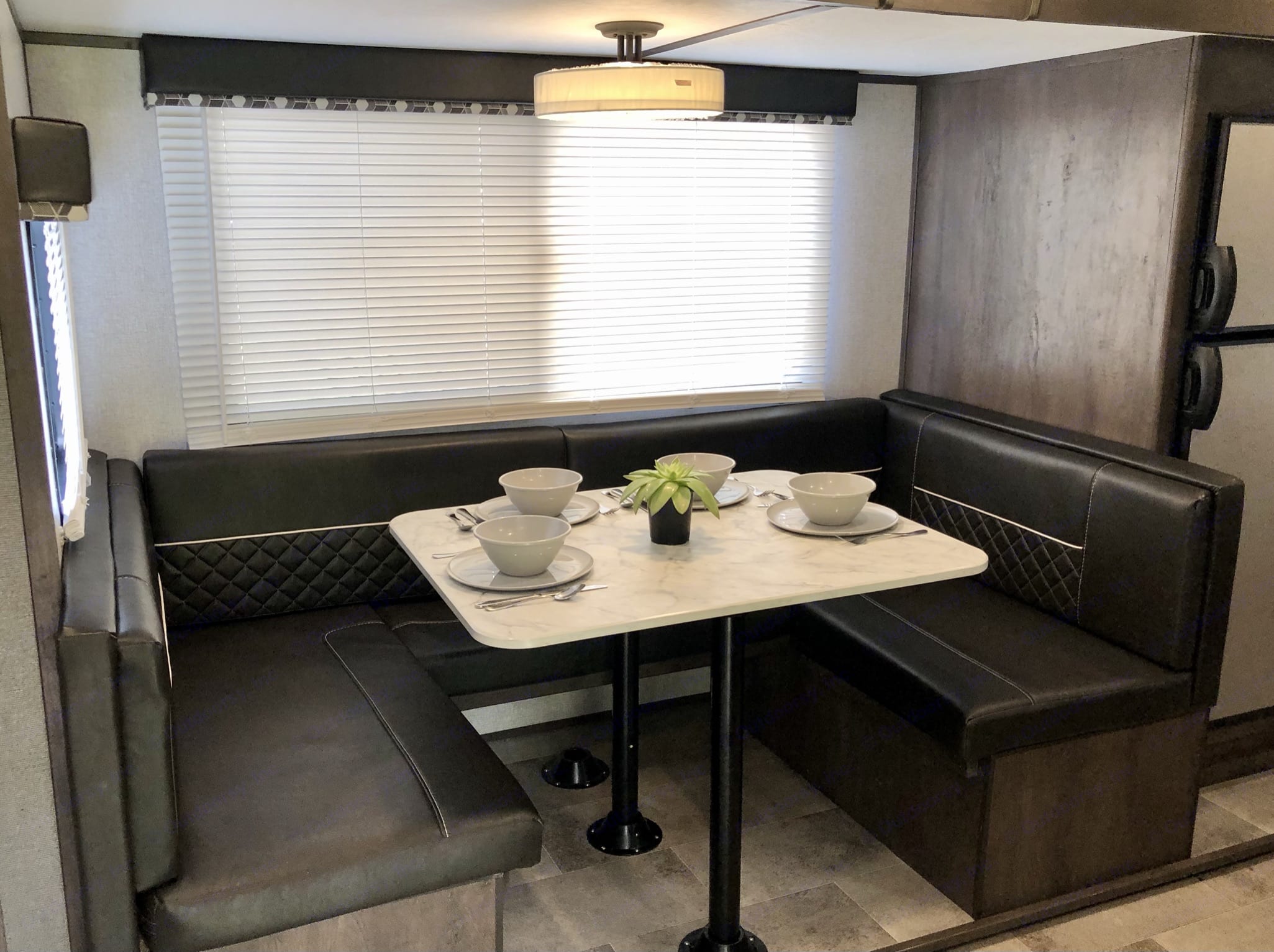 Dinette area can seat up to 6 people and has more than your average RV elbow-room.. Coleman Other 2021