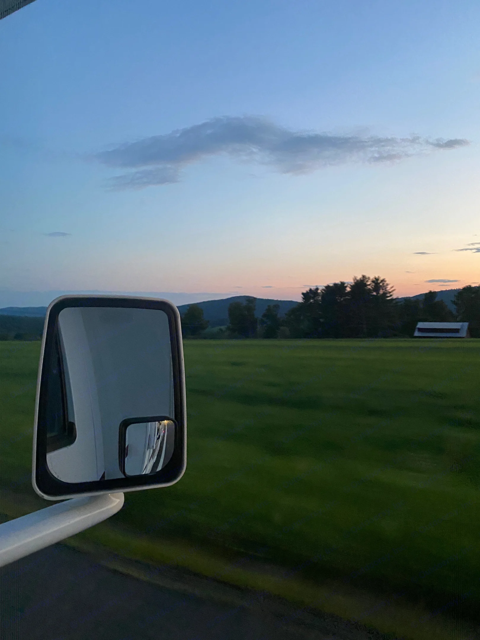 A sunset as seen from the passenger seat. Thor Four Winds 2021