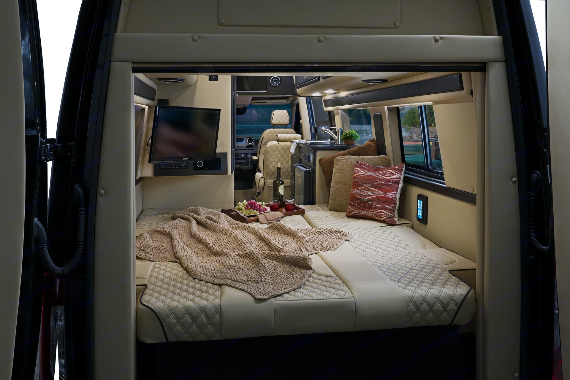 This stock photo is exactly like ours but is not our specific unit. The rear seats together make 2 twin area sleepers OR a Queen Size Bed. . Midwest Automotive Designs Midwest Automotive Designs Class B 2020