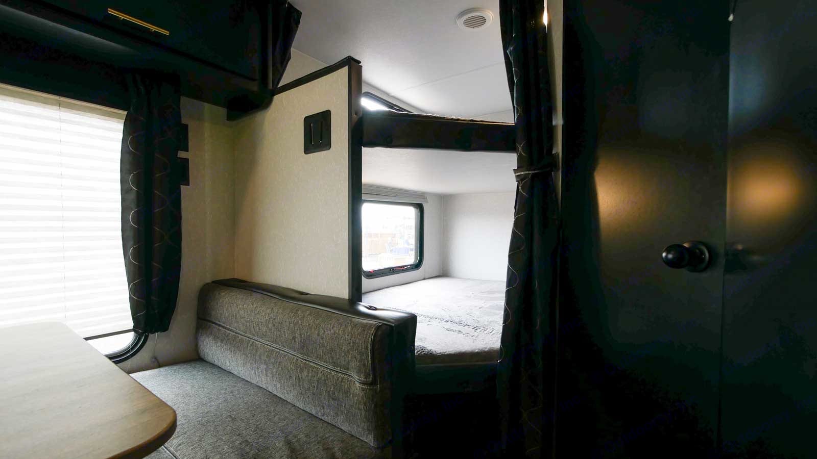 Each bed sleeps two people up to 6 ft tall. Forest River Cherokee Grey Wolf Special Edition 2021