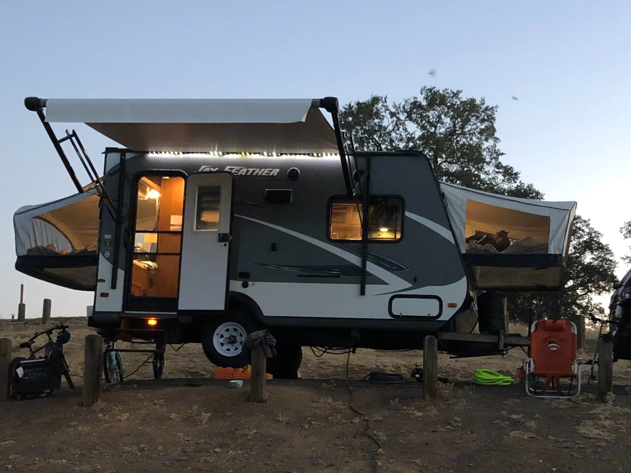 Our trailer is tiny but packs all the functionality of a 25' trailer. Two private bedrooms, full bath, full kitchen and all the outdoor luxuries.. Jayco Jay Feather 2016