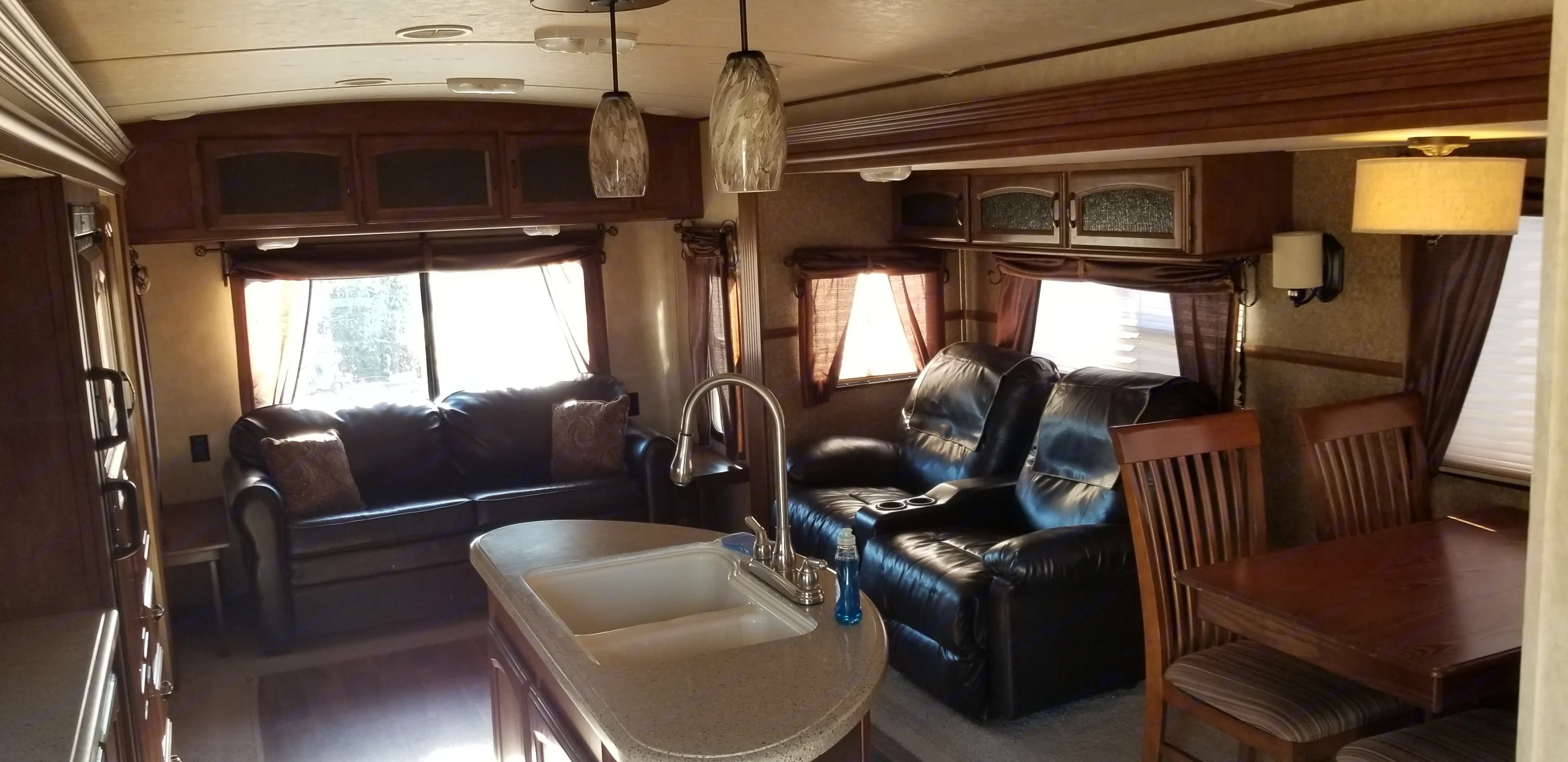 Rear lounge. Rear sofa sleeps 2. 2 hug the wall recliners, recliner also a sleeper and very comfortable. 4 dining chairs with table.. Forest River Salem Hemisphere Lite 2015