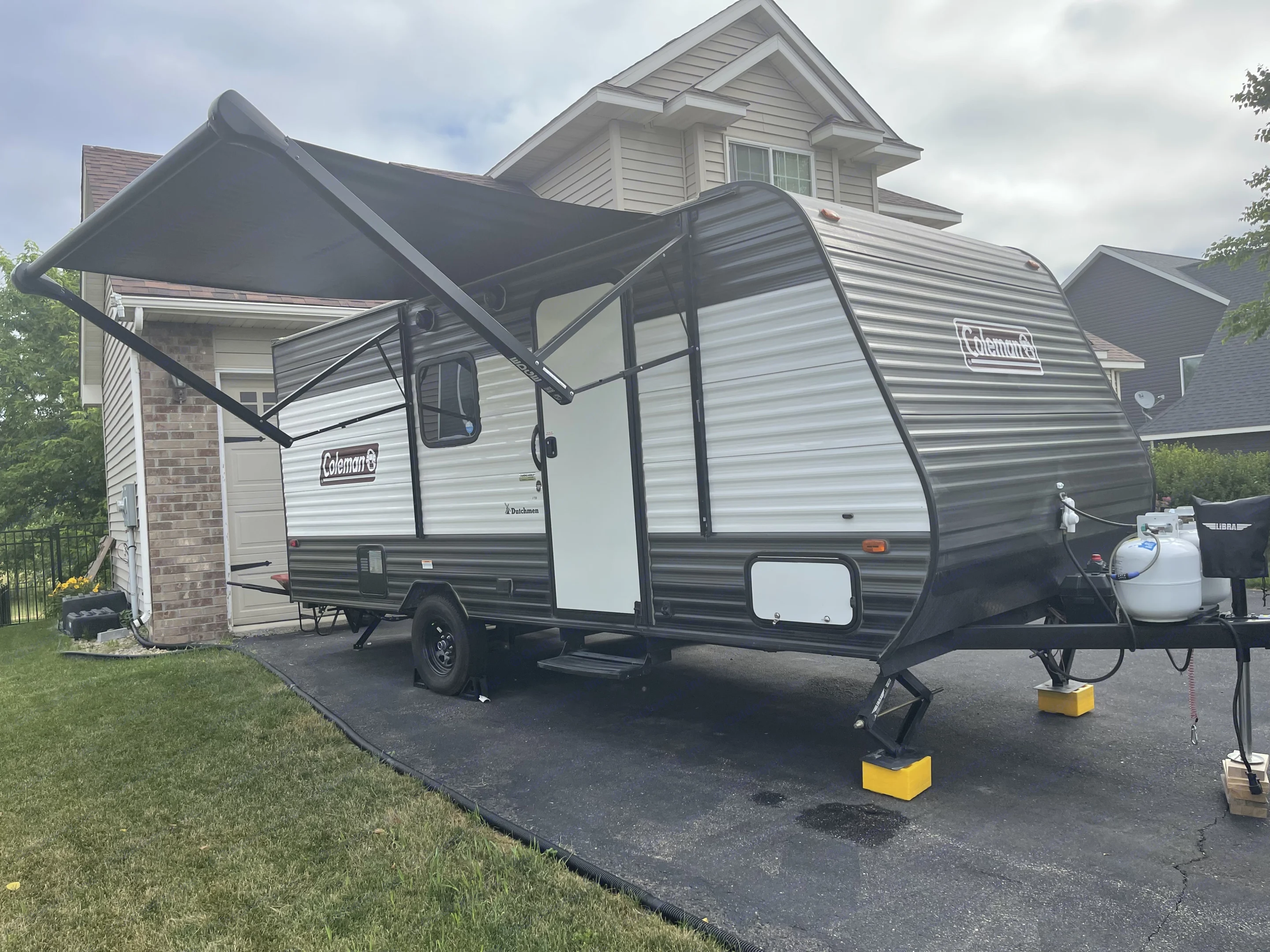 10 Foot power awning with LED lights and Outdoor Speakers! . Dutchmen Coleman Lantern LT 2021