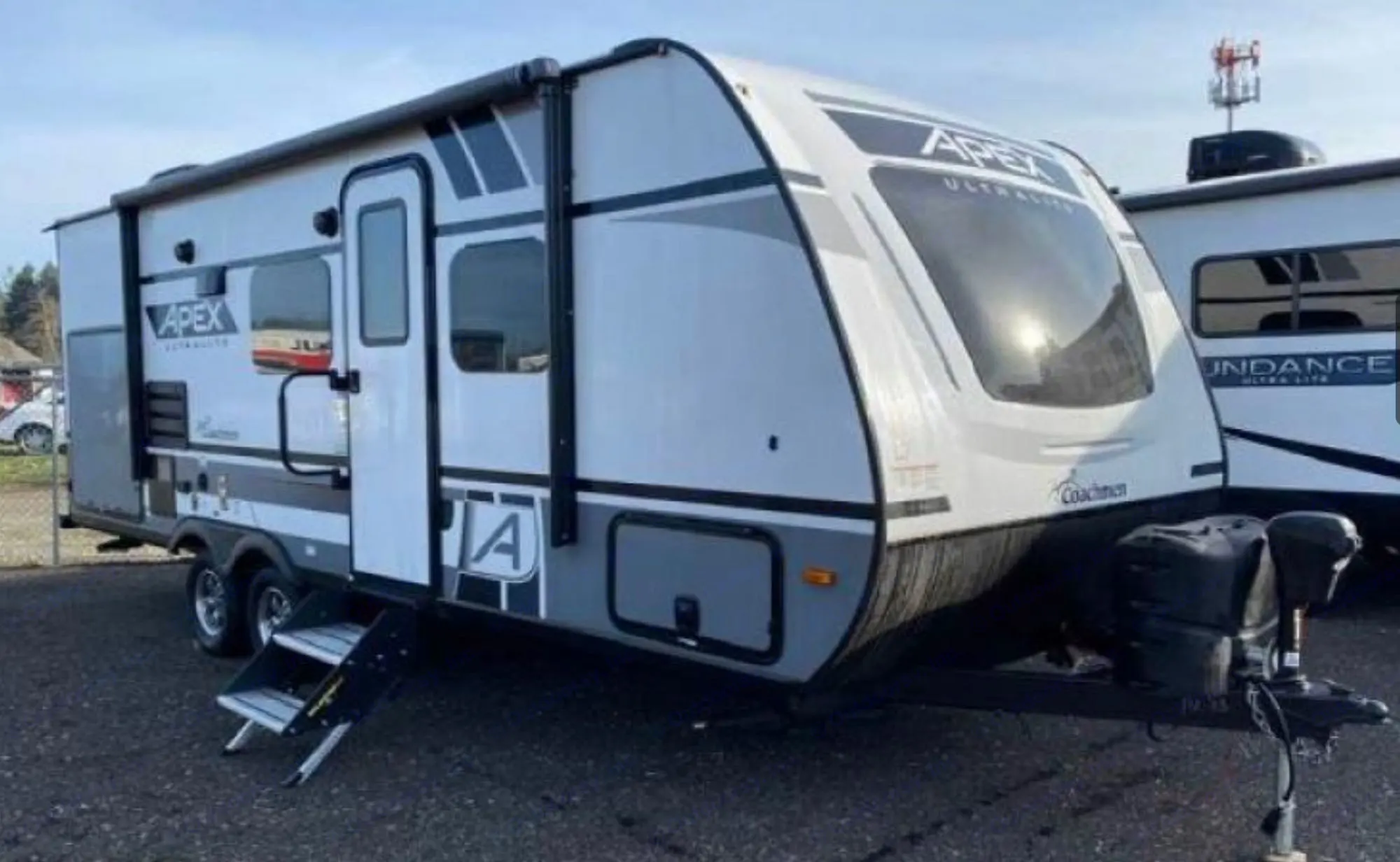 White & gray Coachmen Apex travel trailer. Coachmen Apex 2022