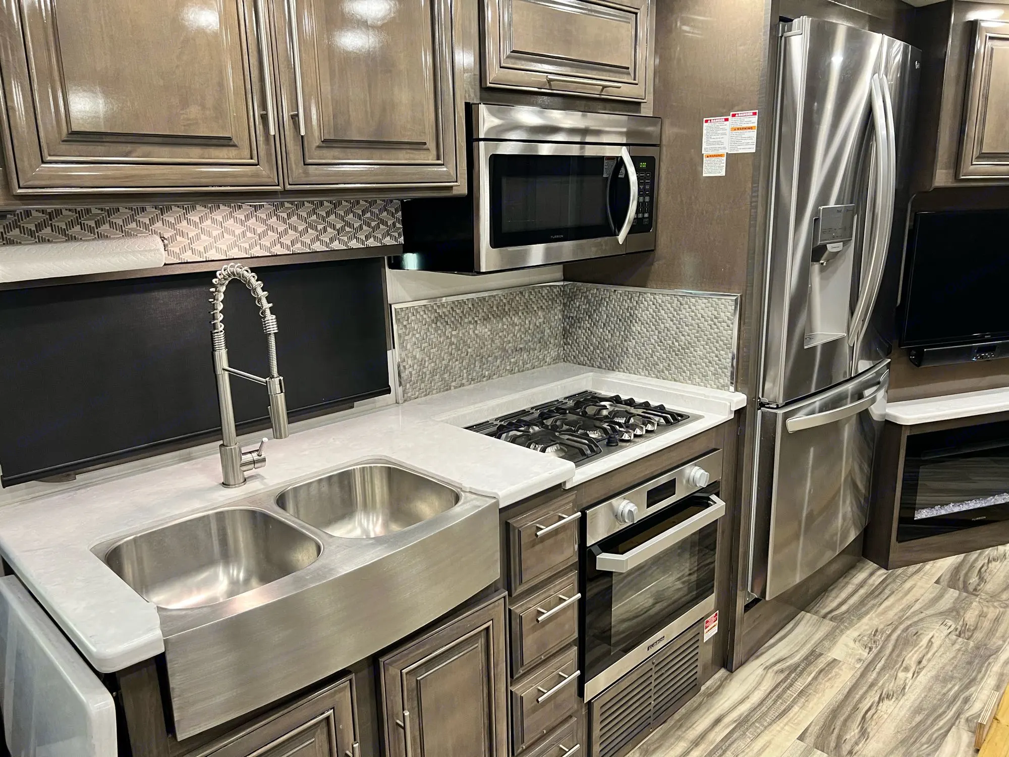 All things kitchen. Farmhouse Double Sink; 3-Burner Stove Top with Oven, Convection Microwave Oven and a Full-Size Residential French Door Refrigerator.. Georgetown GT7 2021