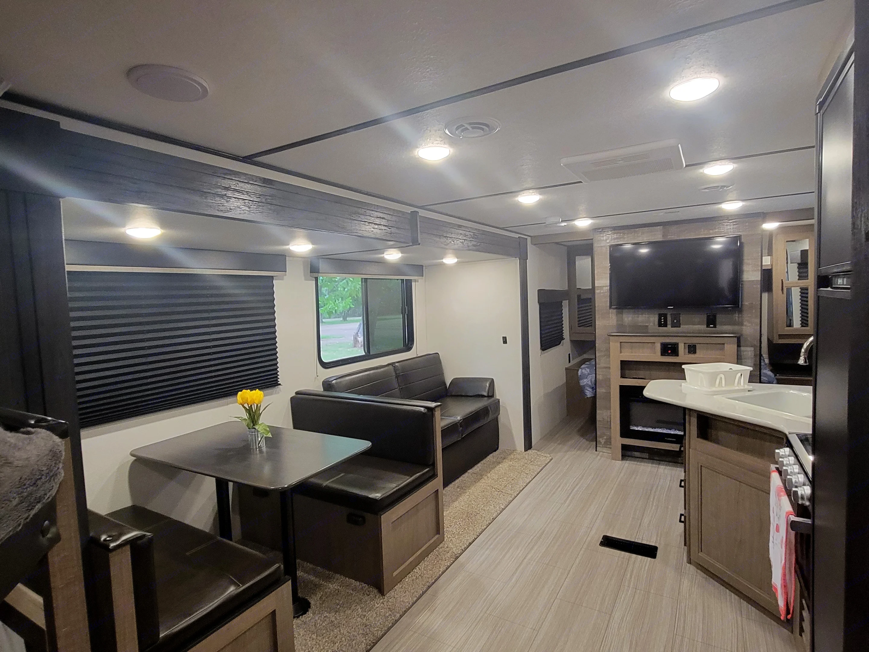Dinette that can be converted into a bed and a sofa convertible into a bed as well. Keystone RV Hideout 2021
