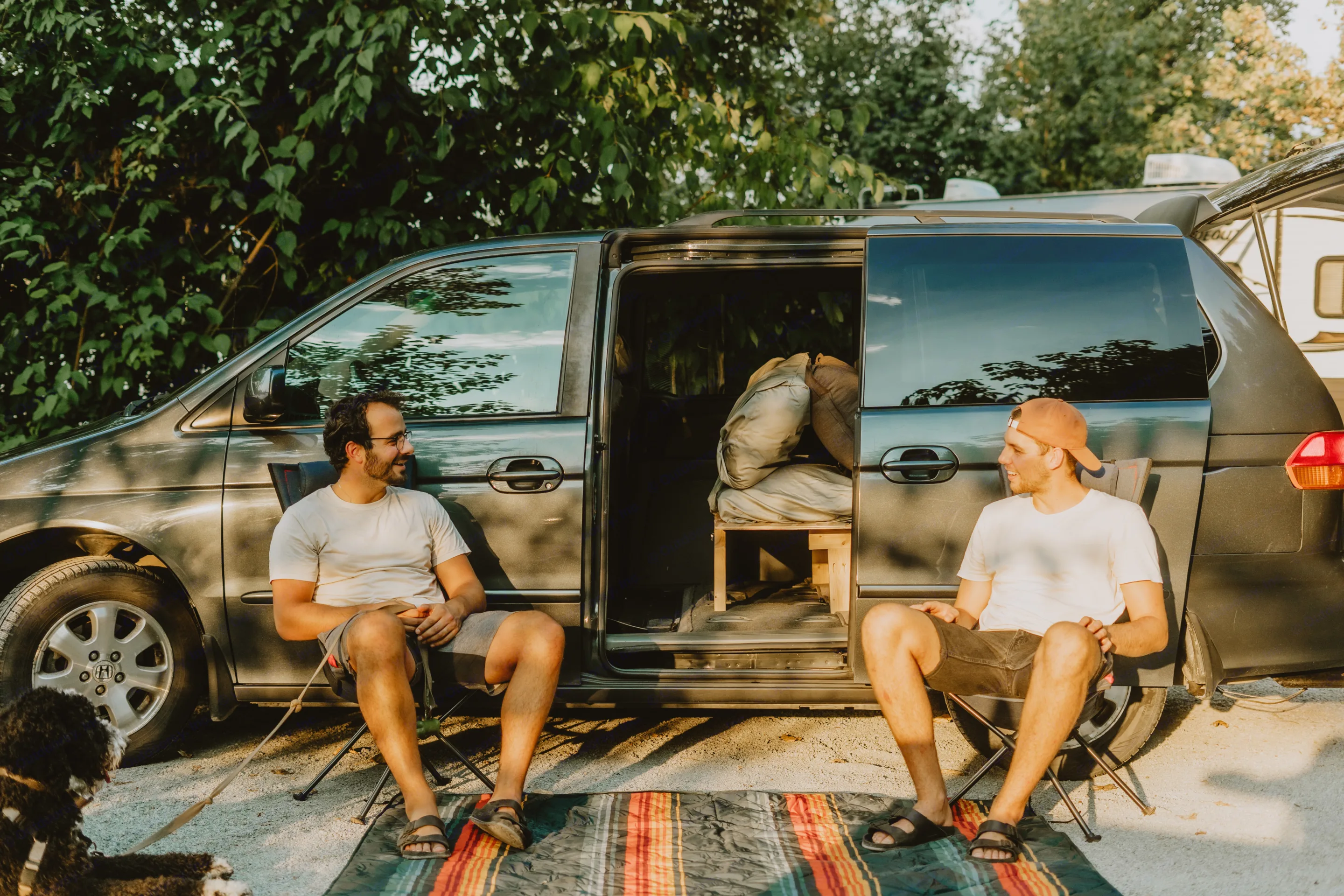 The van comes with two easy to set up chairs and a nice mat for your camping space.. Honda Odyssey 2003