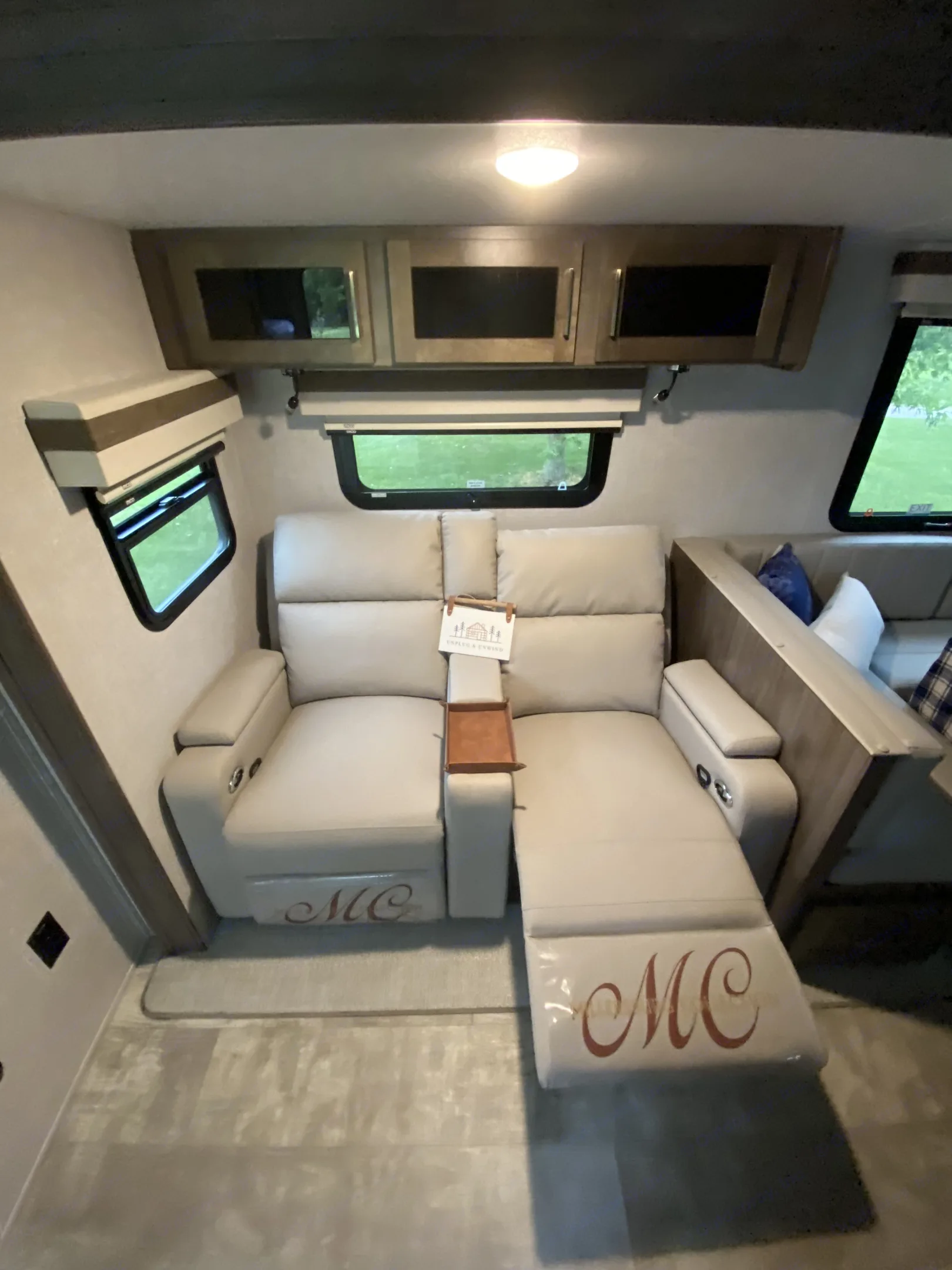 Two very comfortable recliners with direct viewing of TV/Entertainment console, personal lighting feature, and USB ports. USB ports located throughout. Forest River Rockwood Ultra Lite Bunkhouse 2023