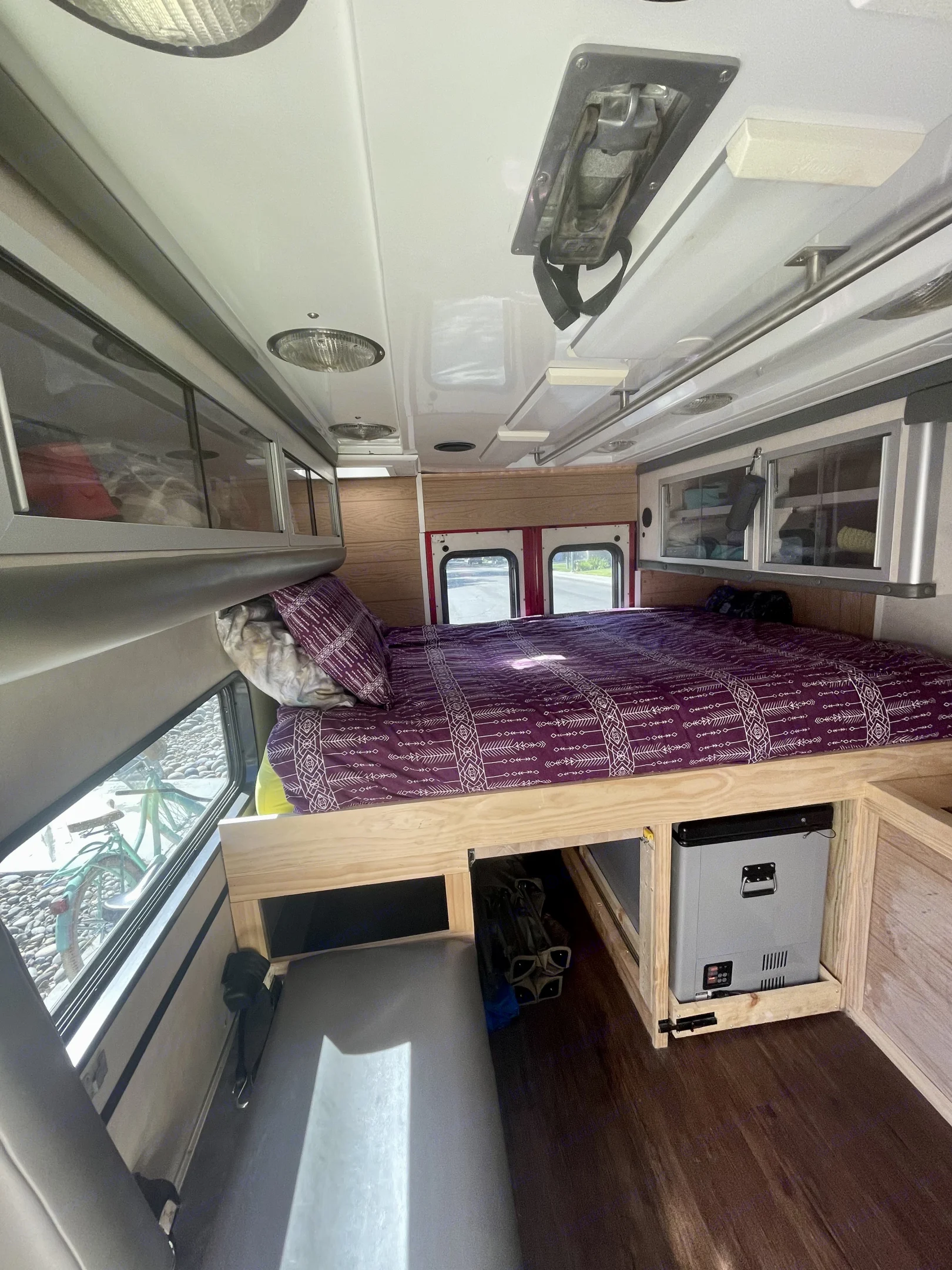 Interior of campulance. Storage compartments on either side of the walls. Tall enough where you won't hit your head. . Ford E450 2005