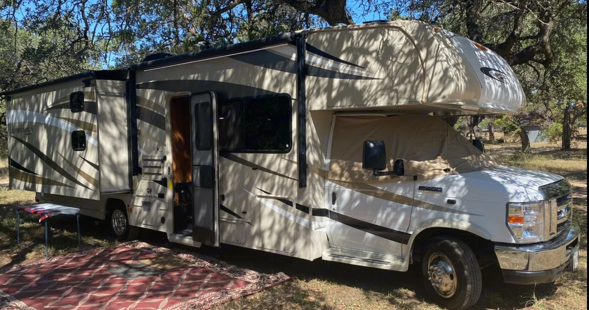 Ricky getting his bluegrass on at the Hill Country String Festival in Driftwood, TX. (Camp Ben McCulloch). Coachman Leprechaun 2018
