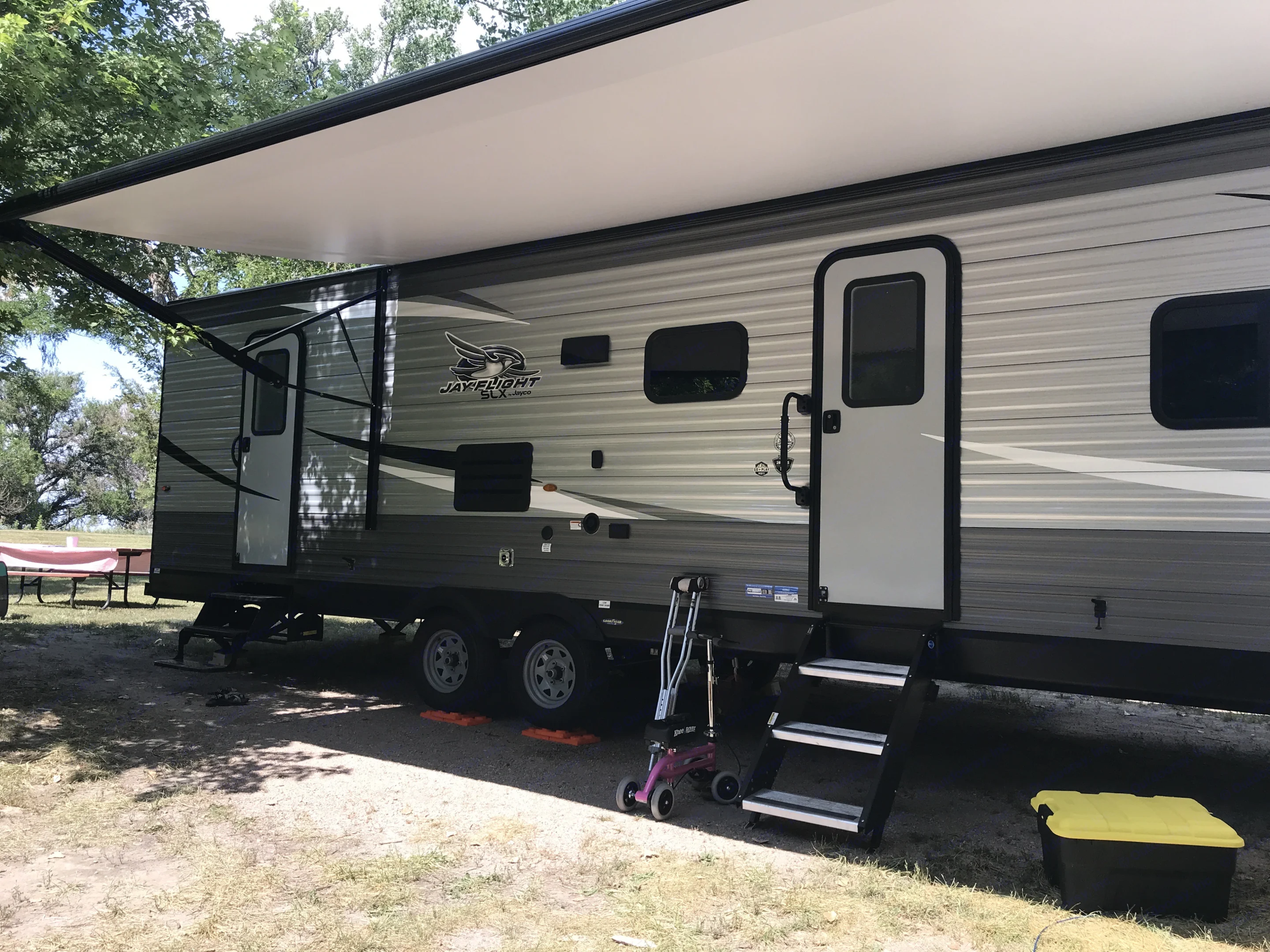 Front door enters into the kitchen and main living area, the rear door enters into the bathroom for easy access throughout the day. . Jayco Jay Flight SLX 2021