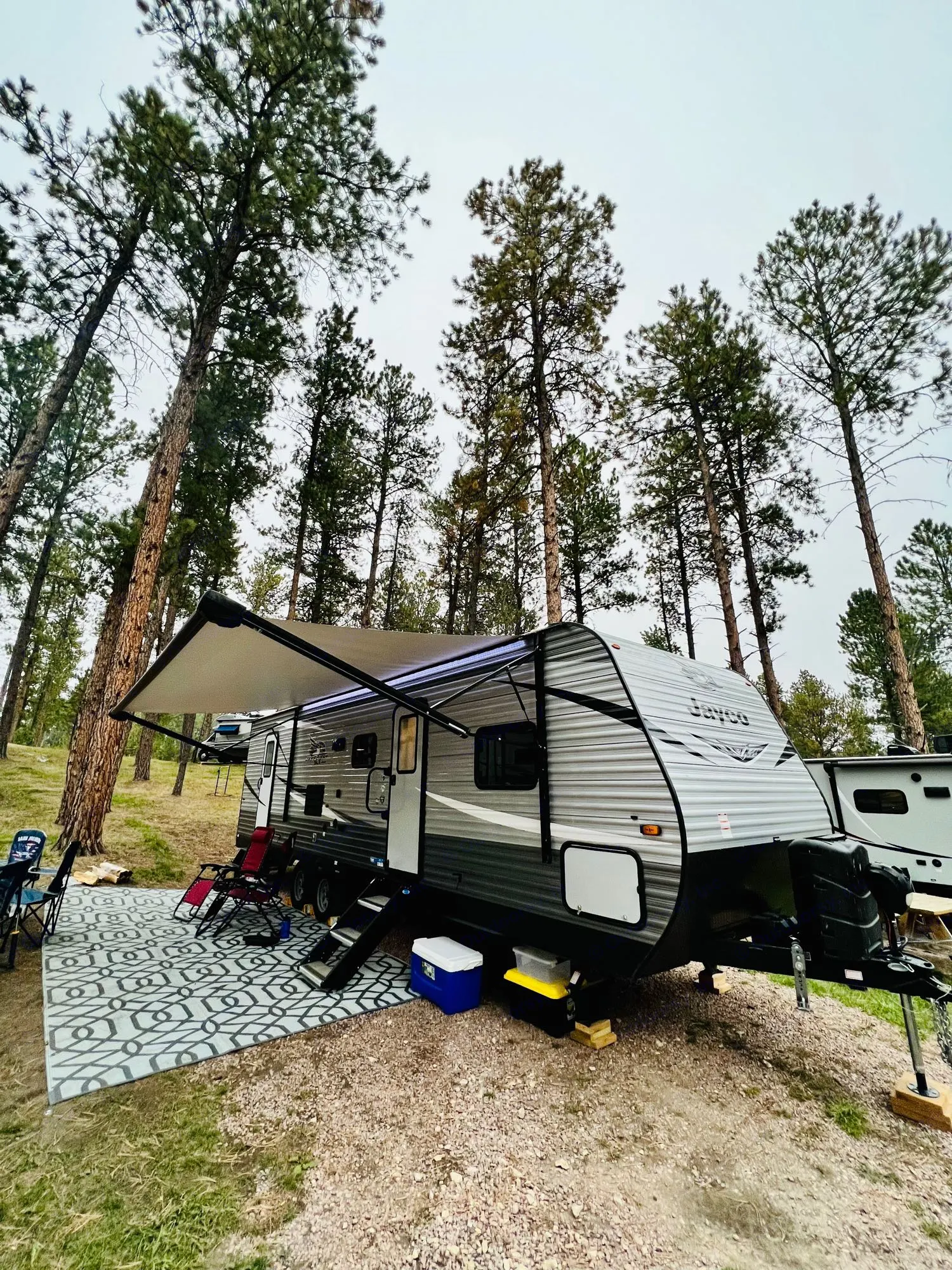 Another view of the trailer setup in a campsite . Jayco Jay Flight SLX 2021