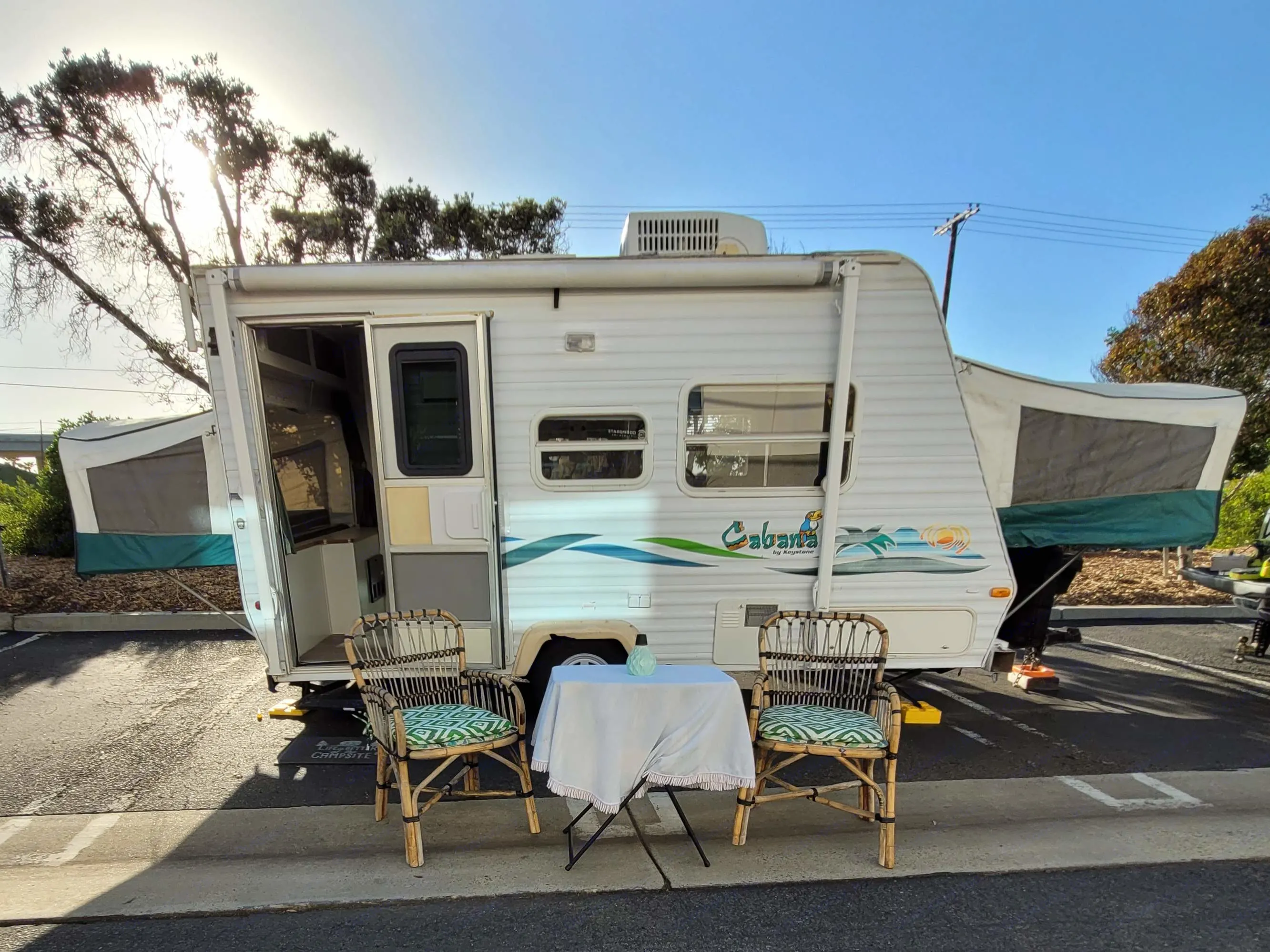 Cabana in the Oasis
This little hybrid camper is a unique glamping experience for the whole family, girls weekend, couple escape or that sole camper.. Keystone RV Cabana 2000
