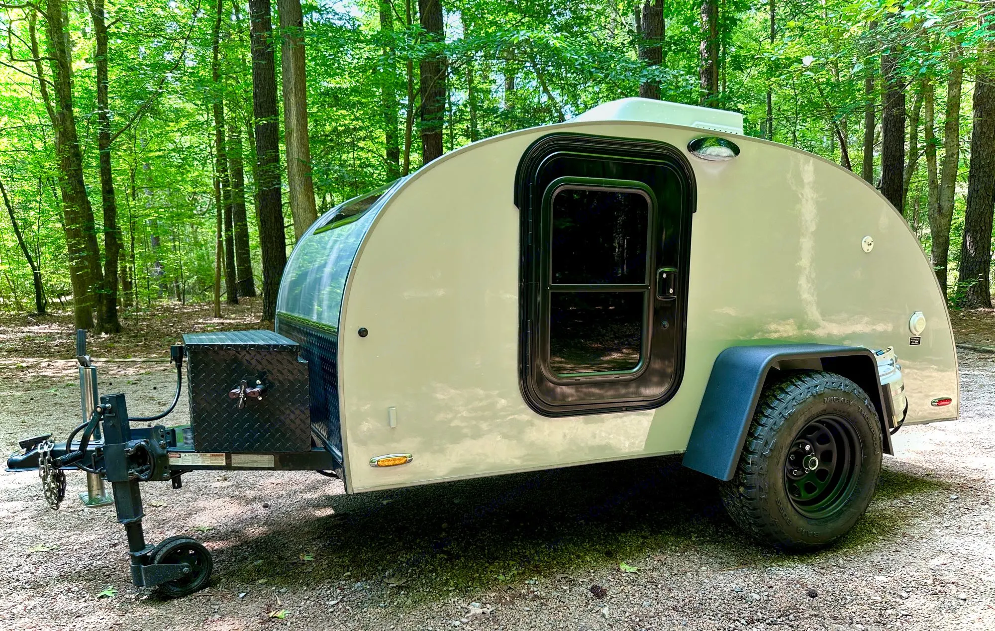 Updated photo of the trailer with the latest renovations featuring off-road tires, off-grid heater, and off-grid air conditioning.. Little Guy Little Guy Trailer 2013