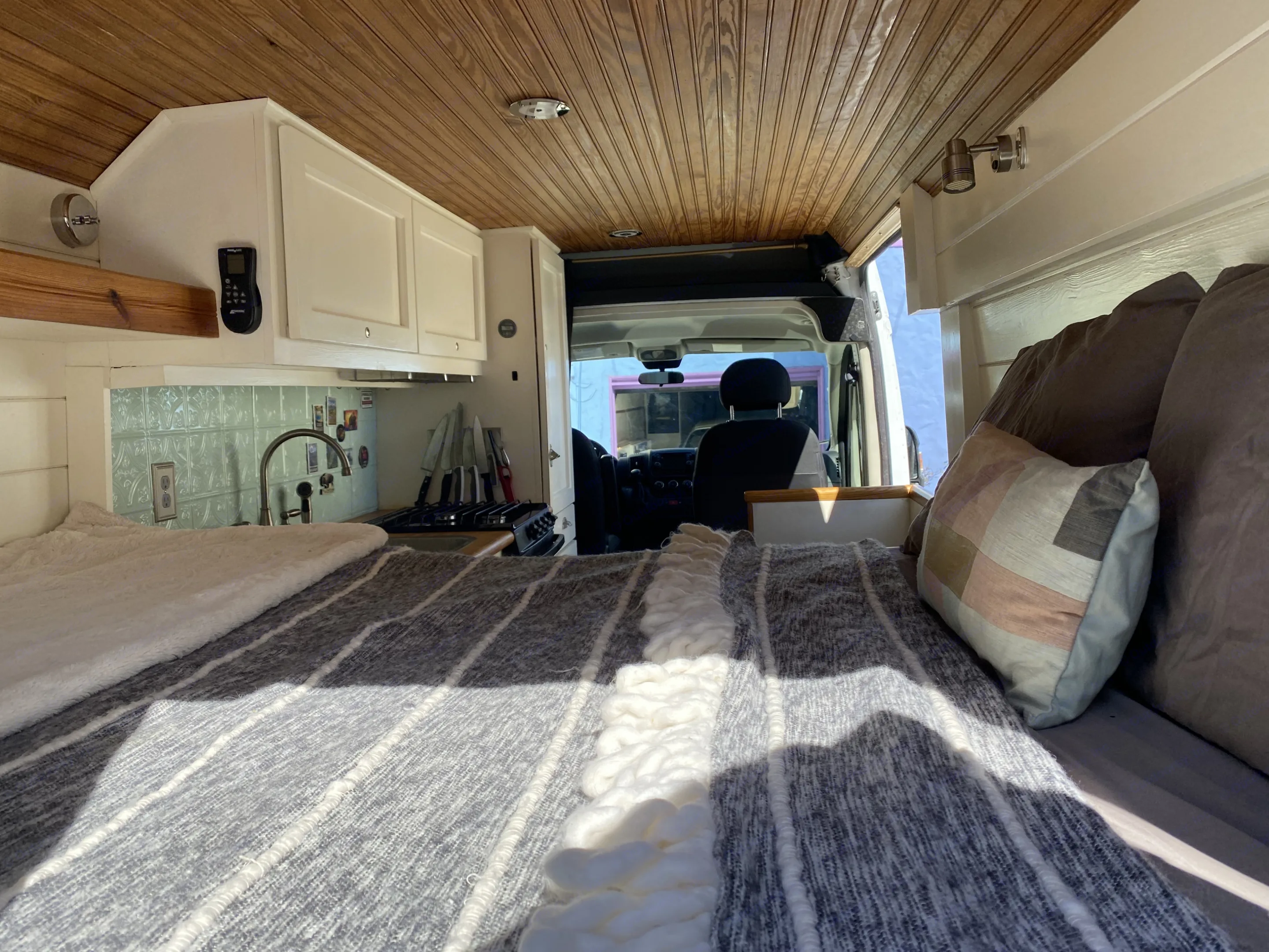 Queen bed. (isn’t great for two if over about 5’10” unless sleeping diagonal or curled up). Ram Promaster 2500 2017