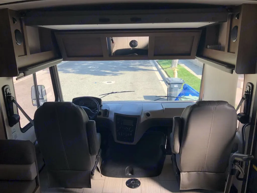 Drive and passenger captains chairs with optional table with drink cups. . FR3 FR3 Motorhome 2020