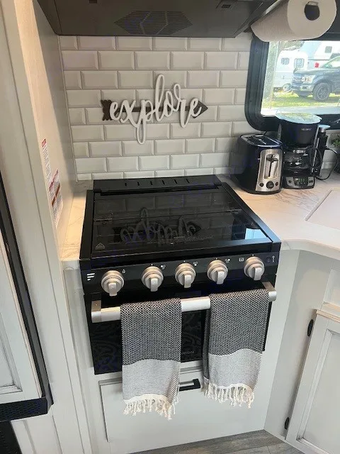 Gas stove and oven - Toaster, Can Opener and Coffee Maker included. . Jayco White Hawk 2022