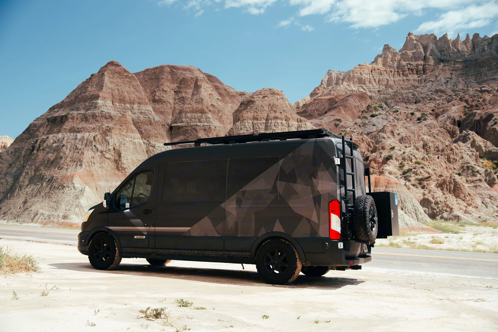 Venturing into the rugged expanse of Badlands National Park, our van stands as a beacon of adventure amidst the dramatic landscape. . Vandoit Vandoit Class B 2020