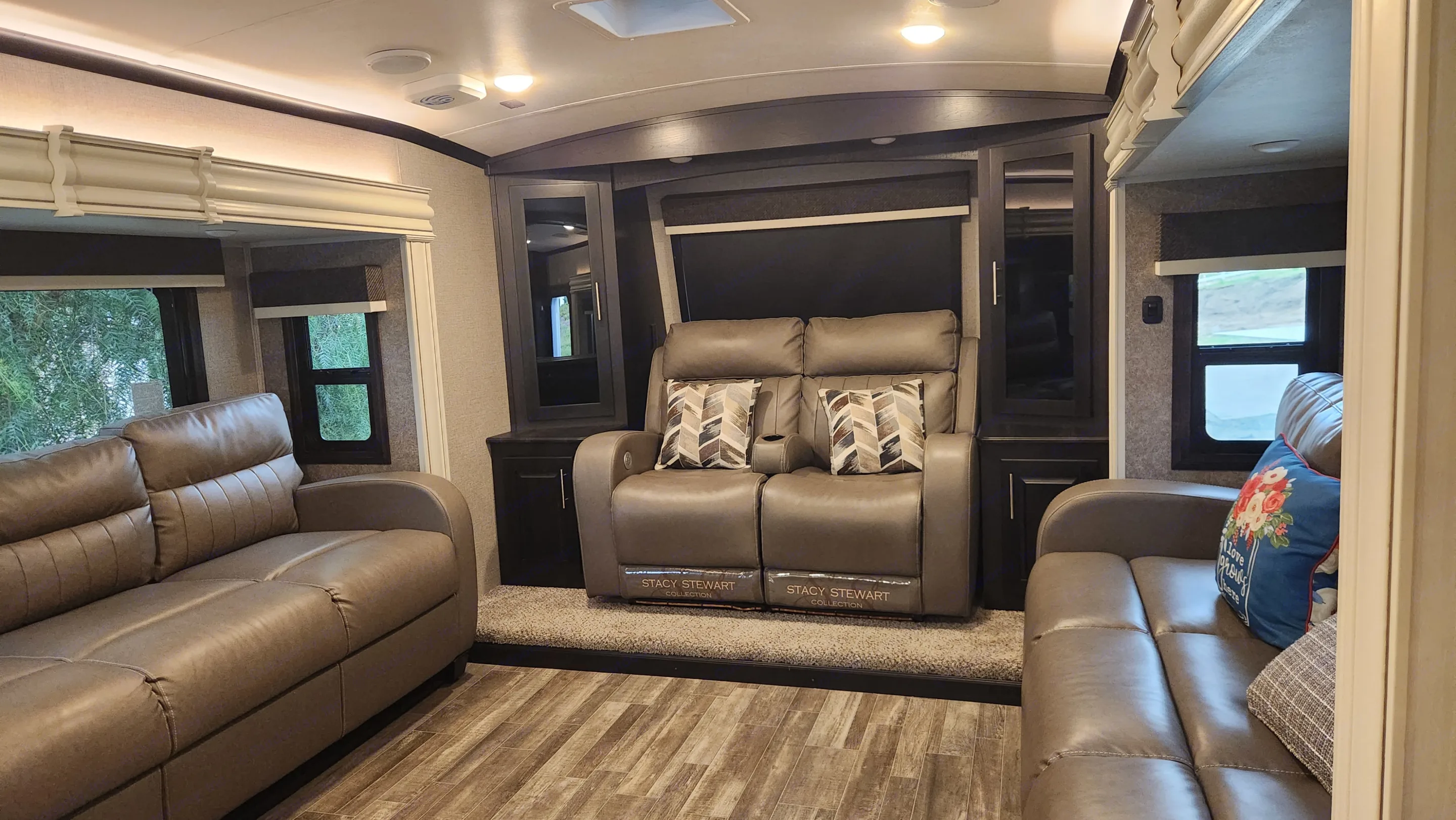Theater Seating, Power recline with heat and massage, opposing couch's that convert into beds . Jayco North Point 2021