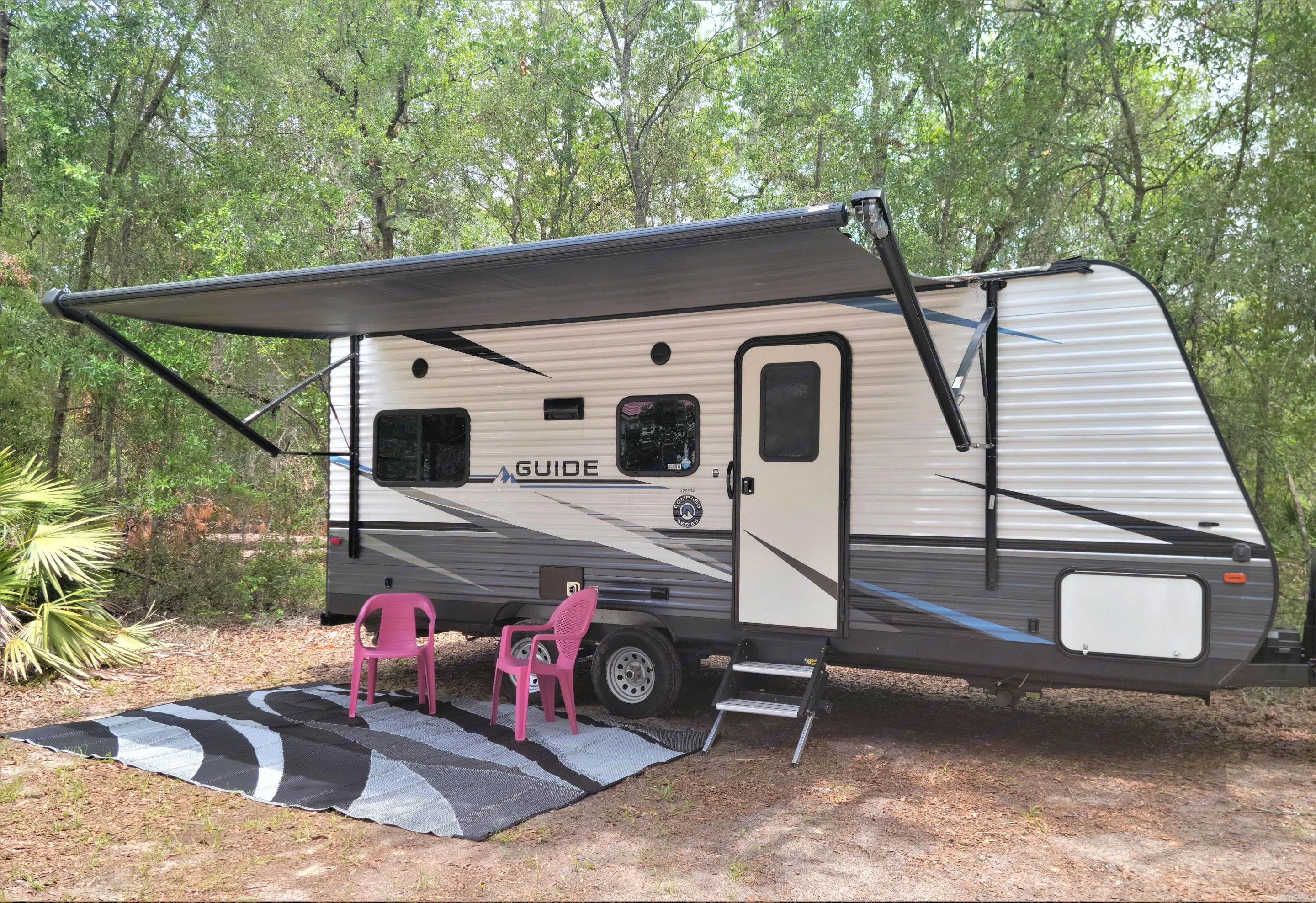 Beautiful, private wooded location in Crystal River Florida with exterior lighting, water and electric hook-ups. Guide Guide Trailer 2020