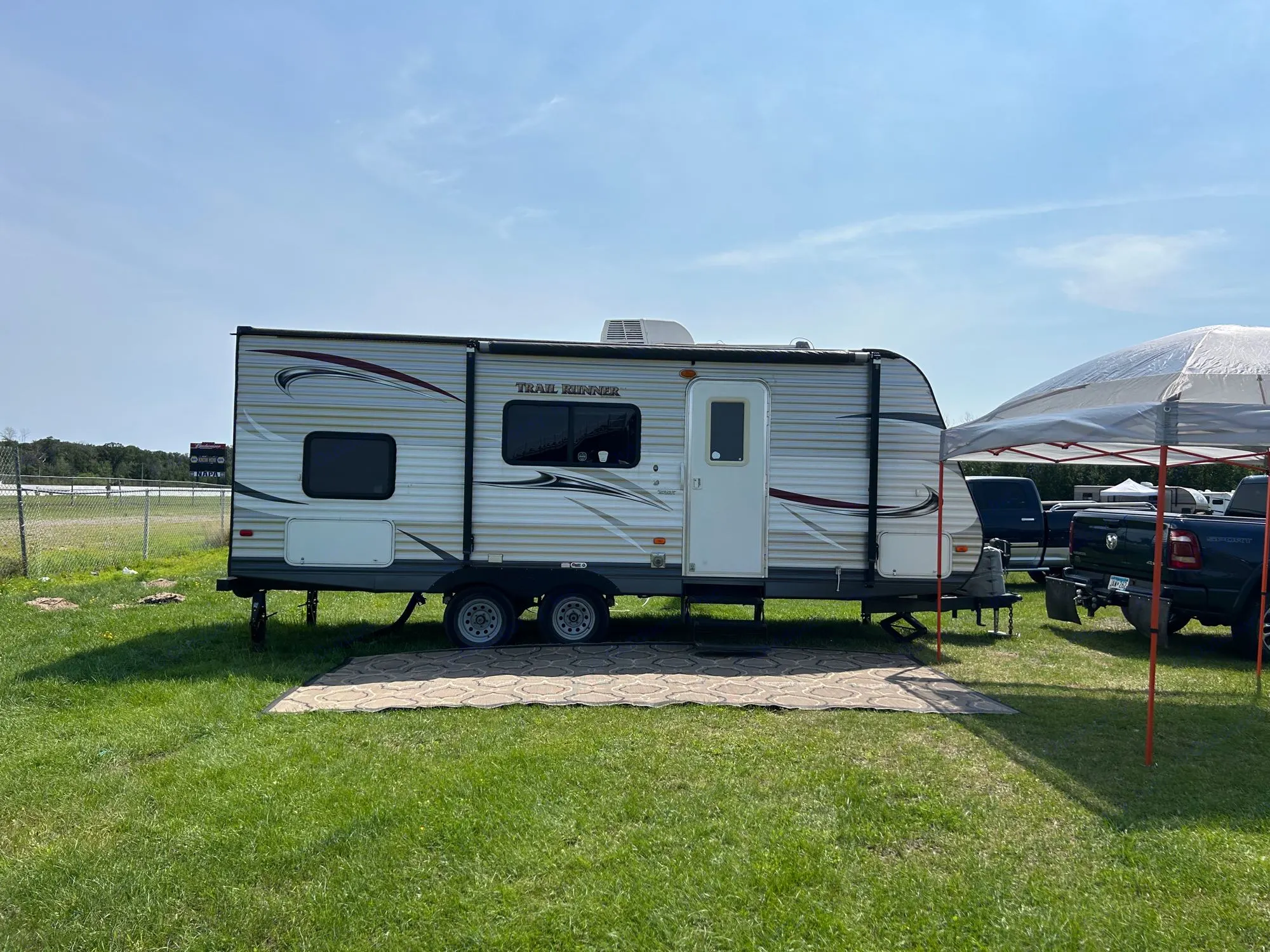 Patio mat and 10x10 Canopy included. Awning is available but canopy is recommended. . Heartland RVs Trail Runner 2014