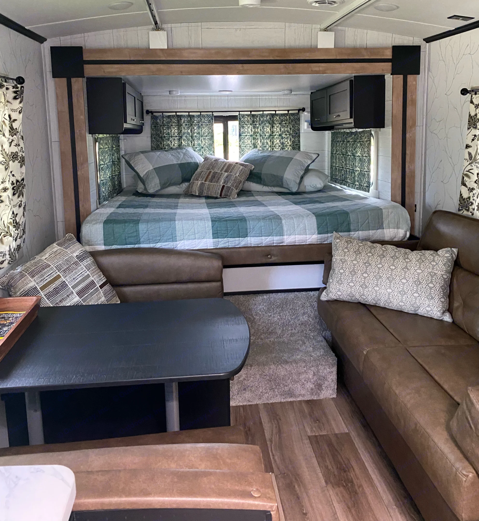 King Bed with a 4 inch gel/memory foam mattress, 2 phone holders near head, 3 individual overhead lights for reading.
Dinette on Left folds down for sleeping - 40" x 70". Couch on Right folds down for sleeping - 42" x 58".
All lines and pillows provided.. Keystone Outback 2022