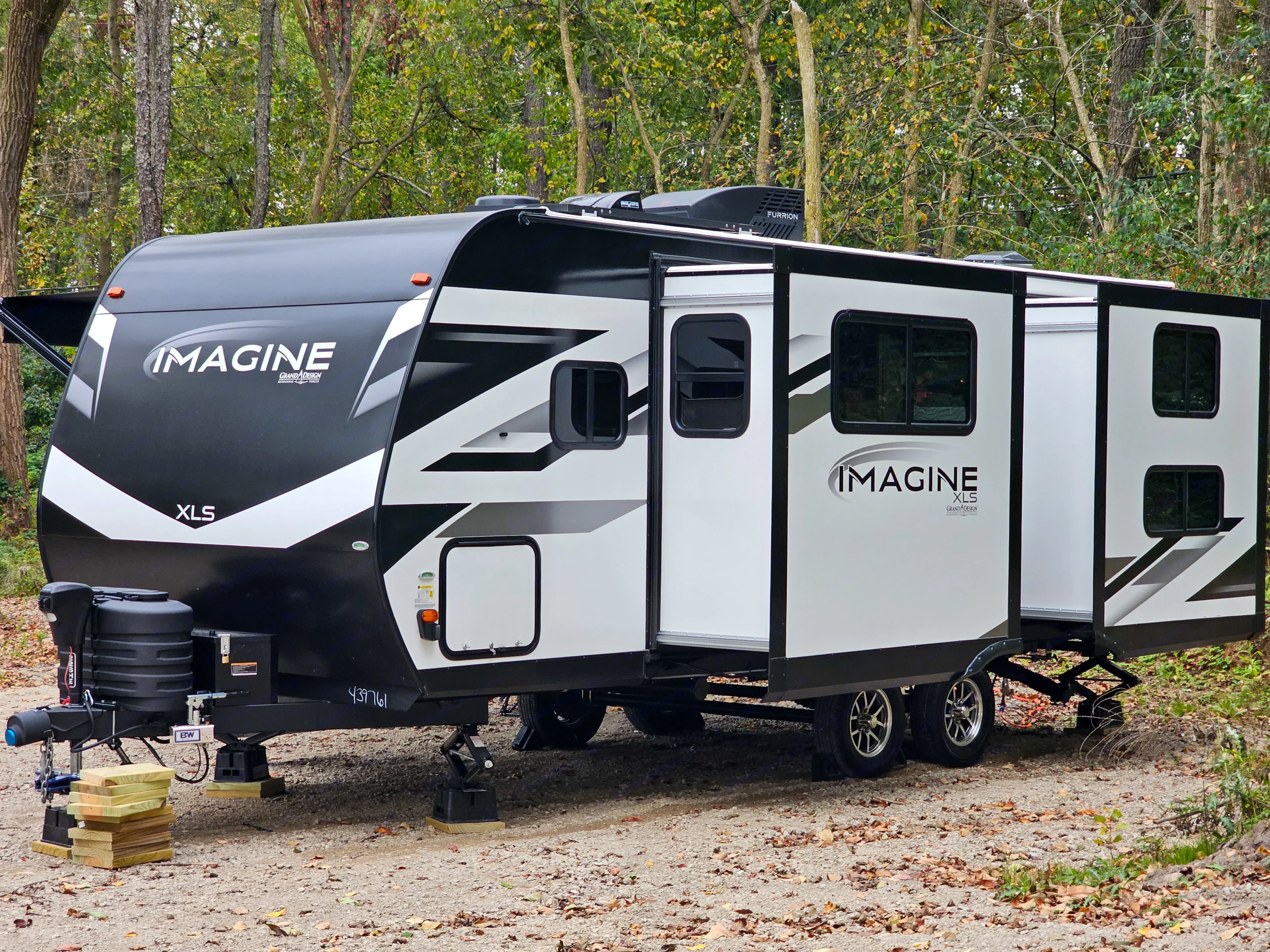 Exterior Drivers Side with Both Slides out.. Grand Design Imagine XLS 2024
