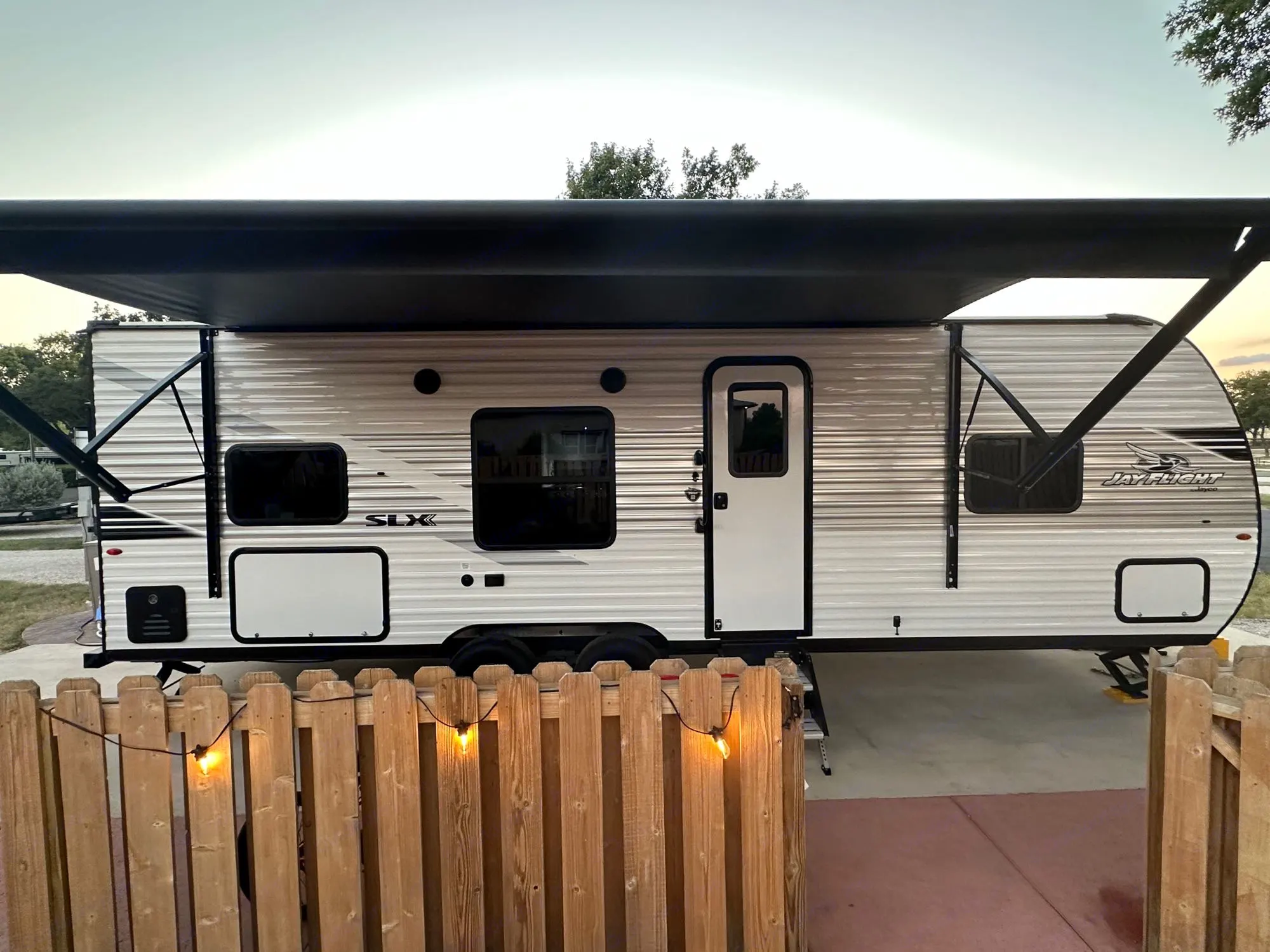 Lights and speakers installed under the awning! Also comes with exterior patio lights should you want to customize your camp site.. JAYCO JAY FLIGHT 260BH 2025